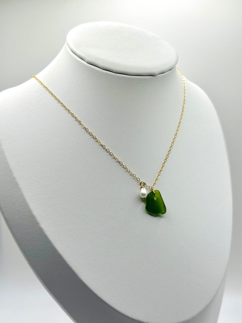 Green Sea Glass paired with a Fresh water Pearl