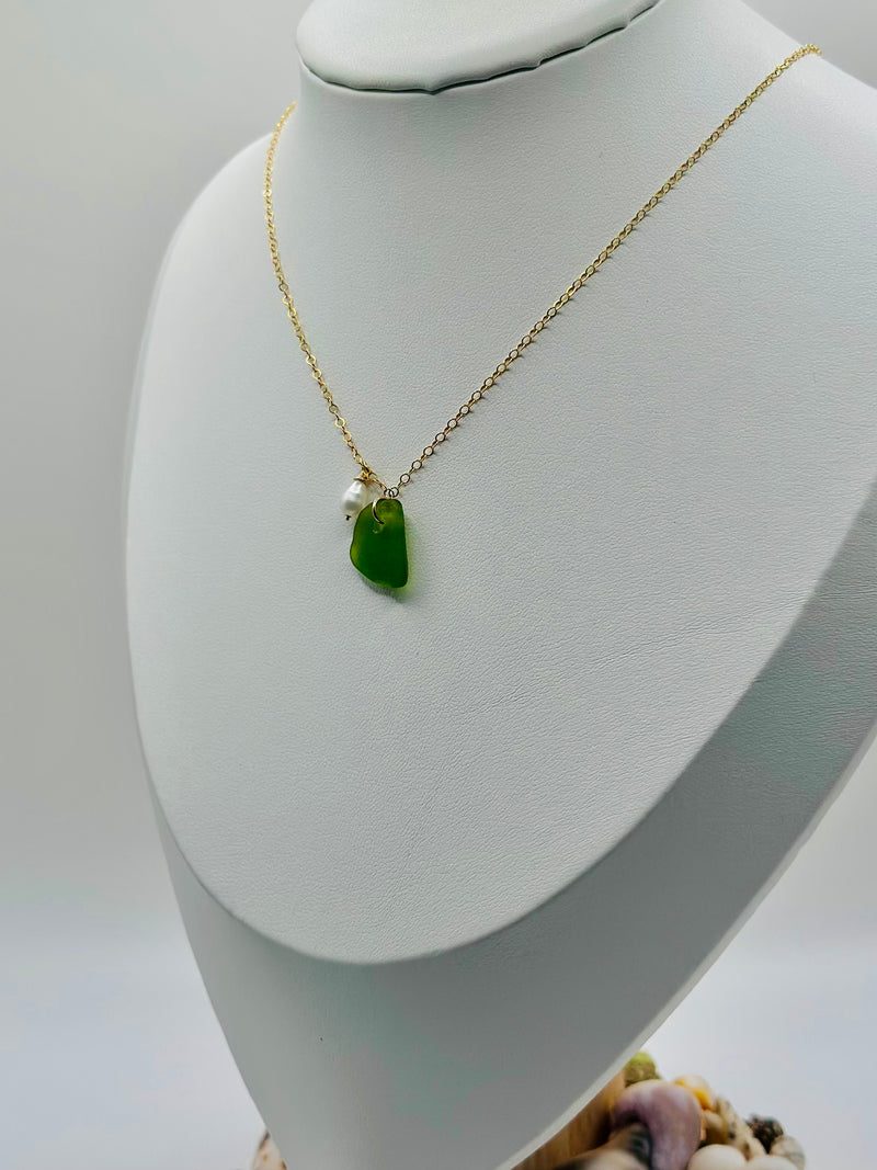 Green Sea Glass paired with a Fresh water Pearl