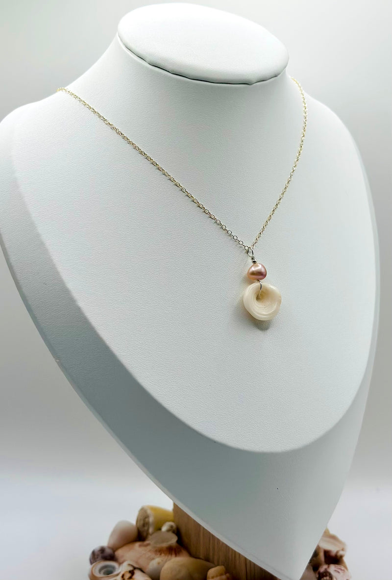 Hawaiian Puka Shell paired with pink fresh water Pearl